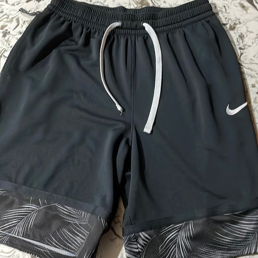 Nike men’s basketball shorts, size large